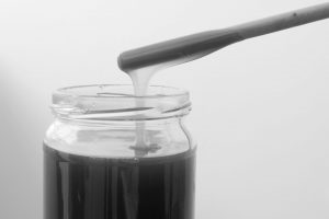 Frontal,Image,Of,Glass,Jar,With,Screw,Cap,Containing,Barley